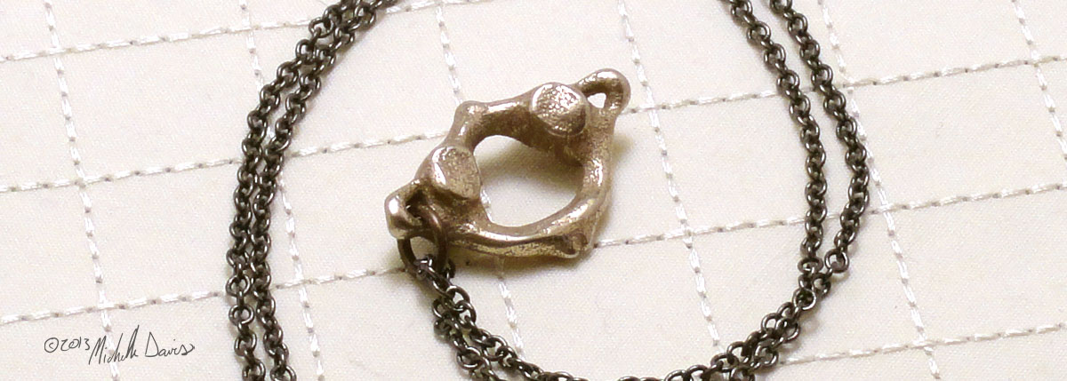 Atlas pendant in stainless steel photo 1 by Michelle Davis