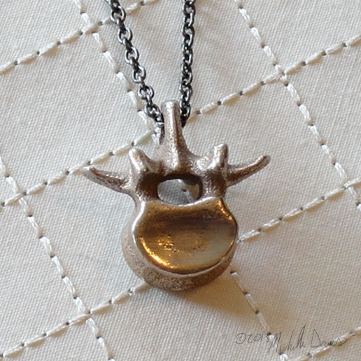 L3 vertebra pendant in photo 3 by michelle davis